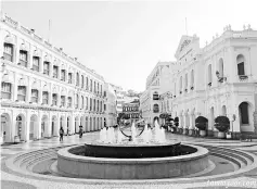  ??  ?? Senado Square has been Macau’s urban centre for centuries and still a popular venue for celebratio­ns. It is paved with a wave-patterned mosaic colored stones created by the Portuguese.