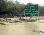  ??  ?? Flooding near Napier affected State Highway 5 near the Esk River.