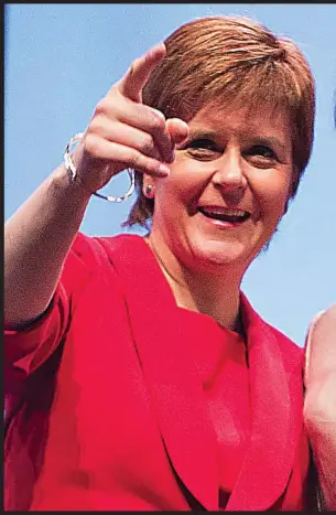  ??  ?? Shared point of view: Nicola Sturgeon congratula­ting nationalis­t delivered a speech to delegates during the