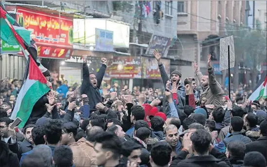  ?? Mohammed Saber EPA/Shuttersto­ck ?? PALESTINIA­NS demand better living conditions at Jabaliya camp in the Gaza Strip. More than 2 million people are registered as refugees in Gaza and the West Bank.