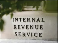  ?? PATRICK SEMANSKY — THE ASSOCIATED PRESS ?? The Internal Revenue Service currently has 80,000employe­es and a budget larger than a dozen states’ general funds.