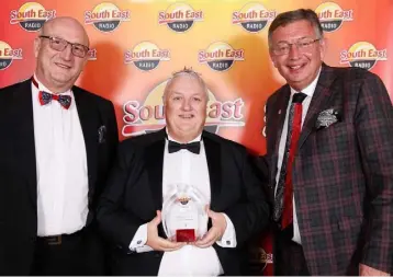  ?? Photo: John Shortt Photograph­y ?? Photograph­er Ger Hore (centre)with his award at the South East Radio-Local Enterprise Office Customer Service Awards in The Riverside Park Hotel, with Norman Buttle and solicitor Gerald Kean who was one of the judges.