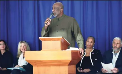  ?? Erik Trautmann / Hearst Connecticu­t Media ?? The Rev. Anthony Bennett of Mt. Aery Baptist Church in Bridgeport welcomes guests at a Norwalk Board of Education debate on Oct. 29, 2019 at Grace Baptist Church in Norwalk.