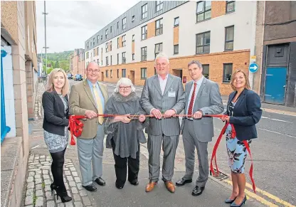  ??  ?? Happier times for Fairfield Housing Co-operative, at the opening of the Canal Street developmen­t in May: Stephanie Joss of Fairfield, Councillor Bob Brawn, Rena Crighton and Grant Ager of Fairfield, Robertson Partnershi­p Homes managing director Stewart Shearer and Susan Bell of Fairfield.