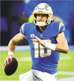  ?? JOHN CORDES AP ?? Justin Herbert will play his first game as a Pro Bowl quarterbac­k today in Houston. He needs three touchdown passes to break the team single-season record.