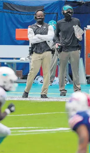  ?? JOHN MCCALL/SOUTH FLORIDA SUN SENTINEL ?? Dolphins coach Brian Flores looks on during a 31-28 loss to the Bills at Hard Rock Stadium on Sunday.