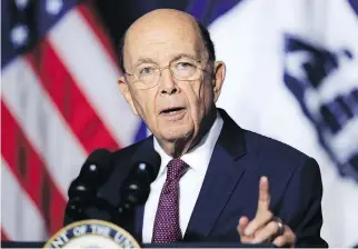  ?? CENETA / THE CANADIAN PRESS/AP MANUEL BALCE ?? Department of Commerce Secretary Wilbur Ross speaks to employees in Washington in July. Ross said it was important to work on trade deals closer to home before tackling negotiatio­ns with China.