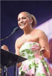  ?? MATT WINKELMEYE­R/GETTY IMAGES ?? Jennifer Lopez accepts the Spotlight Award onstage during the 31st Annual Palm Springs Internatio­nal Film Festival Film Awards Gala at Palm Springs Convention Center on January 02, 2020 in Palm Springs.