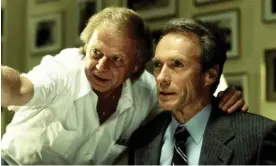  ?? Photograph: United Archives GmbH/Alamy ?? Wolfgang Petersen directing Clint Eastwood in the 1993 thriller In The Line of Fire.