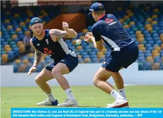  ?? AFP ?? BRIDGETOWN: Ben Stokes (L) and Joe Root (R) of England take part in a training session one day ahead of the 1st ODI between West Indies and England at Kensington Oval, Bridgetown, Barbados, yesterday.—