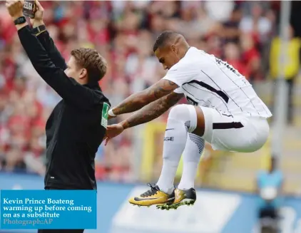  ??  ?? Kevin Prince Boateng warming up before coming on as a substitute Photograph:AP