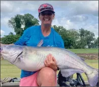  ?? (Arkansas Democrat-Gazette/Bryan Hendricks) ?? Cam Pitts had the highest weight caught by a female angler at the Catmasters catfishing tournament at Helena-West Helena on Friday and Saturday.