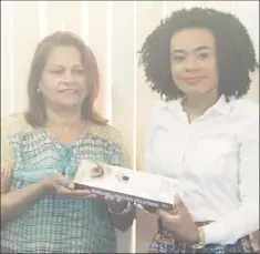  ??  ?? Nowattie Gloria Subraj (left) of the Subraj Foundation Transplant­ation Team hands over a quantity of surgical items to Chairperso­n of the Georgetown Public Hospital Corporatio­n Kesaundra Alves at a simple ceremony yesterday