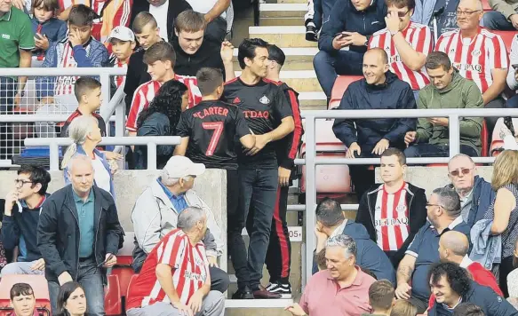  ??  ?? Juan Sartori bonds with Sunderland fans.