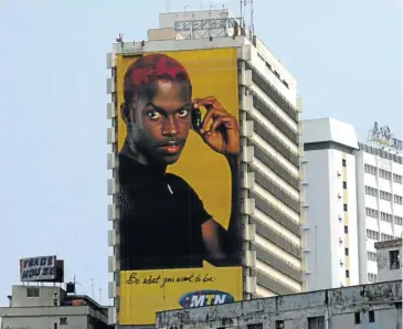  ?? Picture: GEORGE ESIRI/REUTERS ?? WIN SOME, LOSE SOME: An MTN sign dominates the skyline in downtown Lagos, Nigeria, where the mobile operator gained 8 million subscriber­s while it suffered the loss of about 400 000 in South Africa