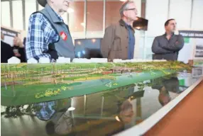  ??  ?? Plans for the future of Tom Lee Park are displayed for the public at the Beale Street Landing on Feb. 2. JOE RONDONE / THE COMMERCIAL APPEAL