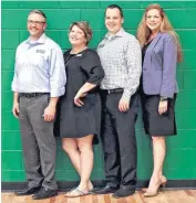  ??  ?? Heartland Middle School and district administra­tors include, from left, Jason Galloway, principal of Heartland Middle School; Laura McGee, assistant principal; Gabriel Schmidt, assistant principal; and Christina Hoehn, Edmond School District chief...
