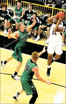  ?? MARK HUMPHREY ENTERPRISE-LEADER ?? Prairie Grove senior Demarkus Cooper waltzes through the air while handling a pass in the corner against Greenland. The Tigers beat the Pirates, 42-30, on Friday, Dec. 15.