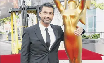  ?? Rich Fury / Invision / AP ?? Jimmy Kimmel will host the Emmys, the first big Hollywood ceremony to attempt a live, albeit socially distanced, broadcast during the coronaviru­s pandemic.