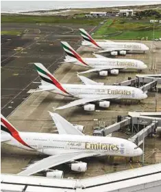  ?? Gulf News archives ?? Emirates aircraft at Auckland Airport. The new rules would affect passengers flying from Dubai and Doha to New Zealand.