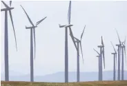  ?? Paul Chinn / The Chronicle 2016 ?? Wind power from turbines like these in Birds Landing once cost a lot more than today’s prices.