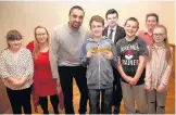  ??  ?? Pictured is Jit Singh, one of the leaders of Shelthorpe Youth Club, with Leon Sheerin, 11, one of the members of the youth club, who won the Youth Club of the Year Award at the 2017 Pride of Charnwood Awards, along with members of the 2016 winners of...