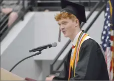  ?? TIMES photograph­s by Annette Beard ?? Valedictor­ian Brenden Power addressed his classmates during the Saturday, May 15, graduation ceremony in Blackhawk Arena.