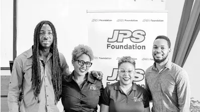  ?? ?? JPS Foundation head Sophia Lewis (second left) poses for a photo with JPS Foundation officers Samora Bain, Aundrhae Richardson (right) and assistant control engineer at JPS, Roabl Gavel.