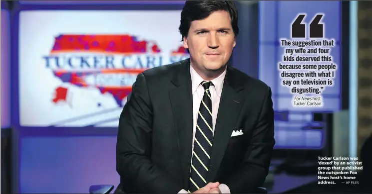  ?? — AP FILES ?? Tucker Carlson was ‘doxed’ by an activist group that published the outspoken Fox News host’s home address.