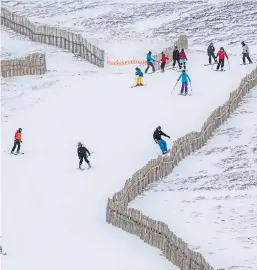  ?? Pictures: Steve Macdougall. ?? Busy times at the Glenshee Ski Centre, which has seen its season helped by a man-made snow machine. Enjoying themselves far left are Phillip Dallison, Nicolas Baldanza, Samuel Phillip, 5, and Liam Baldanza, also 5.