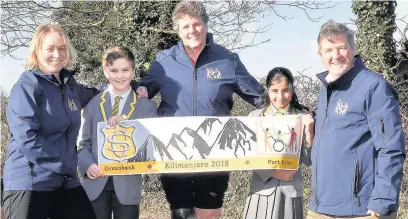  ?? Mike Carter ?? ●●Kate Mercer, Wendy Baardman and Derek Lowe from Greenbank Preparator­y School in Cheadle Hulme, who are climbing Mount Kilimanjar­o to raise money for a special school in Kenya with pupils Sumaya Riaz and Charlie Brynning