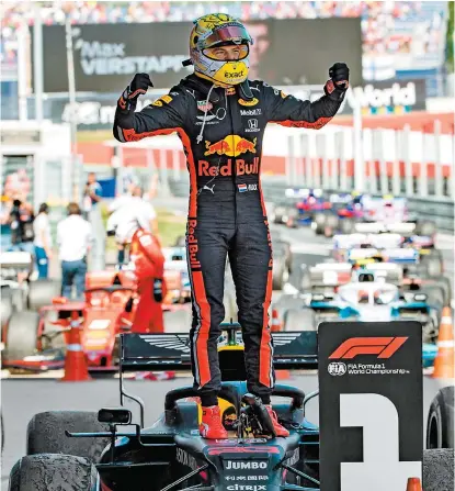  ?? AFP ?? Así celebró el piloto de Red Bull su primera victoria de la temporada.