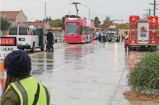  ?? [PHOTO BY WILLIAM CRUM, THE OKLAHOMAN] ?? Embark transit and fire, police and ambulance services conducted an emergency drill last week in preparatio­n for the start of Oklahoma City streetcar service in December.