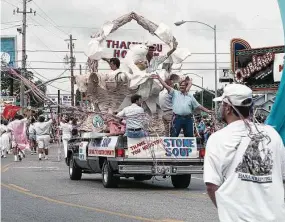  ?? Houston Chronicle file ?? The Gay Pride Parade procedes along Westheimer in 1989. The former Tower Theatre, at that time called Clubland, can be seen at right.