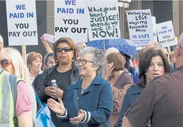  ??  ?? Women Against State Pension Inequality march through Glasgow to protest the change in the pension age for women born in the 1950s