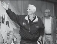  ?? JIM PRISCHING/MCT ?? Astronaut Gene Cernan, the last man to have walked on the moon, waves goodbye as he and Neil Armstrong, the first man to walk on the moon, at O’Hare Internatio­nal Airport in Chicago, Ill., on March 4, 2010. Cernan died on Monday at the age of 82.