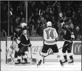  ?? Associated Press ?? GOAL!
The Kings’ Alex Iafallo (19) celebrates after scoring against the Philadelph­ia Flyers during the first period on Tuesday in Los Angeles. The Kings won 5-3.