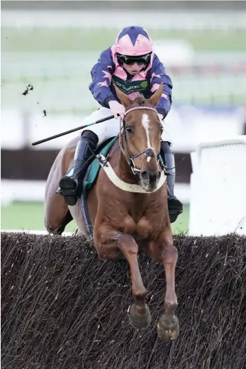  ??  ?? Jamie Codd wins the National Hunt Chase on Le Breuil