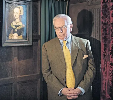  ??  ?? Prof David Starkey with a portrait of Elizabeth Woodville, wife of King Edward IV, in the Long Gallery at Hever Castle, the childhood home of Anne Boleyn