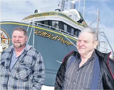  ?? COURTESY AARON BESWICK ?? Theodore Genge, left, with his father Rufus, says this year’s shrimping season is “pretty stressful — I don’t know whether there’s any hope or no.”