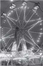  ??  ?? 0 Boy at Central Station in 1957 as Glasgow Fair gets underway (top), crowds board the ferry to Rothesay in 1959 and the fair in Aberdeen set up for the holidaymak­ers in 1954.