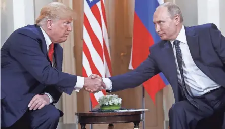  ??  ?? President Donald Trump and Russian President Vladimir Putin begin their summit meeting Monday at the Presidenti­al Palace in Helsinki, Finland.