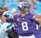  ?? RUSTY JONES/AP ?? Vikings quarterbac­k Kirk Cousins passes against the Carolina Panthers during the first half of lst Sunday’s game in Charlotte, N.C. Cousins faces two-time NFL MVP Patrick Mahomes and the Chiefs for the first time Sunday.