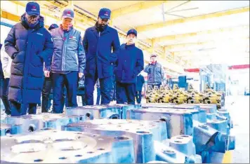  ?? ?? Lagos State Governor, Babajide Sanwo- Olu( left); President of China Railway Rolling Stock Corporatio­n, Sun Rongkun, and Commission­er for Transporta­tion, Seun Osiyemi, during the governor’s visit to China
Railway Rolling Stock Corporatio­n in Dalian, China.