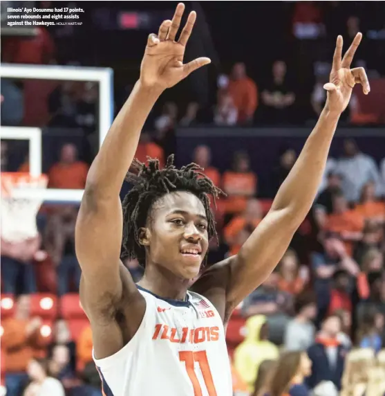  ?? HOLLY HART/AP ?? Illinois’ Ayo Dosunmu had 17 points, seven rebounds and eight assists against the Hawkeyes.