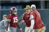  ?? VASHA HUNT — AL.COM VIA THE ASSOCIATED PRESS ?? Alabama coach Nick Saban works on drills with his players during a recent practice.