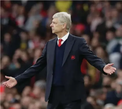  ??  ?? Arsenal manager Arsene Wenger reacts during yesterday’s home draw