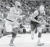  ?? GREGORY SHAMUS/GETTY IMAGES ?? Chris Andersen , right, of Power moves past Carlos Boozer of Ghost Ballers in a Big3 game last week.