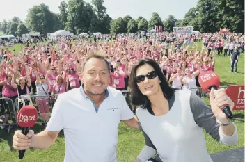  ??  ?? Kev Lawrence and co-host Ros Webb at the Race for Life