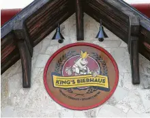  ??  ?? The King’s Bierhaus seal adorns the front of the flagship restaurant in the Heights.